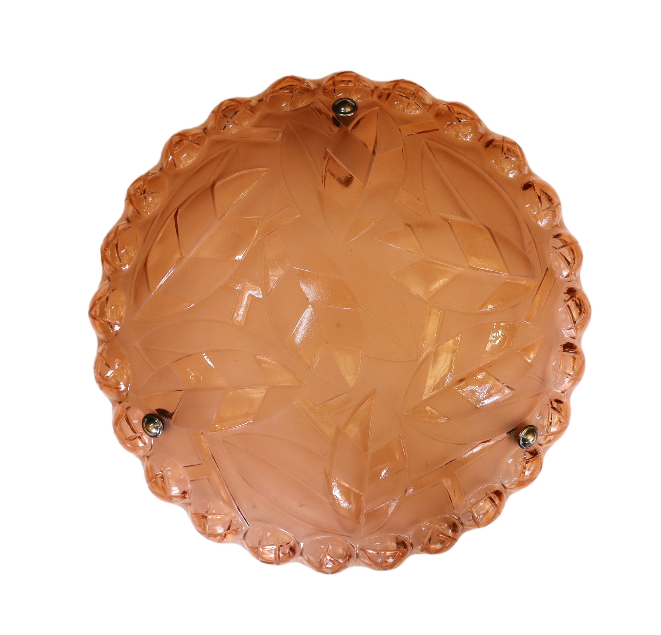 A 1930s French peach glass light bowl moulded with stylised leaves, with chain set and ceiling rose, diameter 39cm